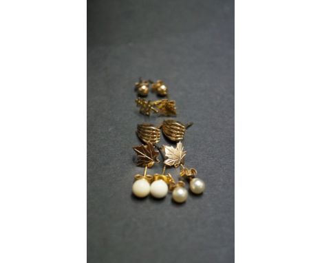 Four pairs of 9ct gold ear studs 3.7g; together with two pairs of 9ct pearl ear studs. [6]