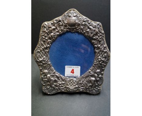 A silver photograph frame, by K F Ltd, London 1981, 17cm.