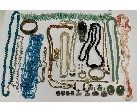 Costume Jewellery - a gilt metal Trifari circular brooch; simulated pearl necklace and earrings, boxed; coral chip necklace; 