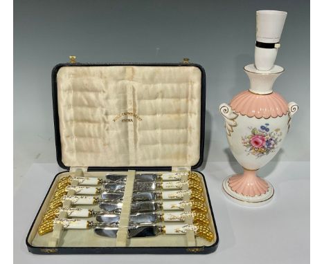 A set of Royal Crown Derby Vine pattern pastry knives and forks, each terminal modelled as a bunch of brightly gilded grapes,