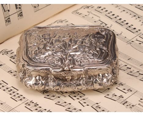 A late 19th century Dutch cast silver bombe shaped table snuff box, hinged cover in relief with a scene from Classical antiqu