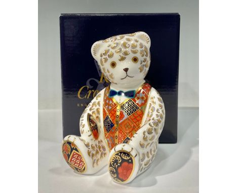 A Royal Crown Derby paperweight, Blue Bow Tie Teddy Bear, gold stopper, boxed 