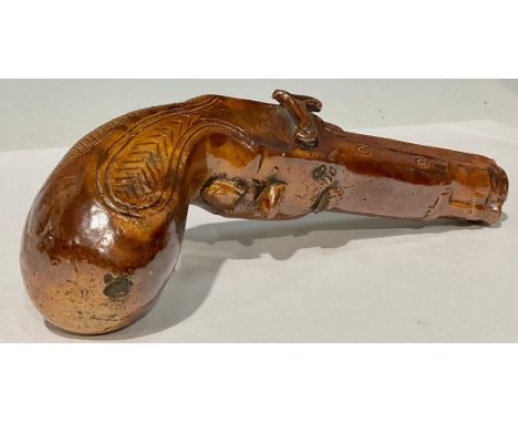 A 19th century Derbyshire brown salt glazed novelty flask, in the form of a pistol, 25cm long, c.1840 