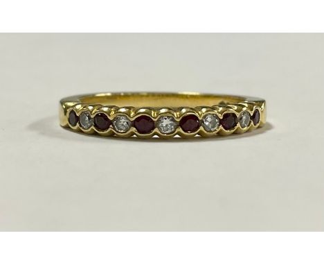 An 18ct gold ruby and diamond ring, size K, 2.9g 