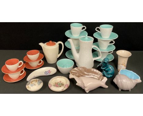 A Poole 'Pebble' two tone coffee pot, cups and saucers, another part set similar in grey and red; a Poole model of a seal; tw
