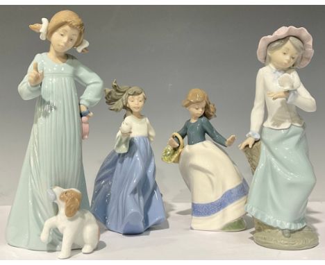 A Nao by Lladro figure, 'Bad Boy', 25.5cm high; others, Girl with Dove, Girl with Basket of Flowers, etc (4) 