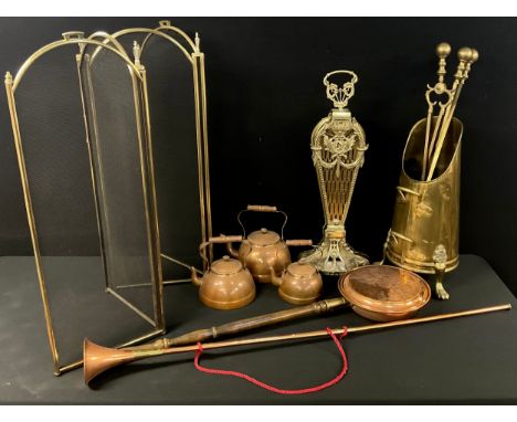 A 19th century style brass folding fan shaped fire screen, 71cm high; a brass coal scuttle; a set of three brass fire irons; 