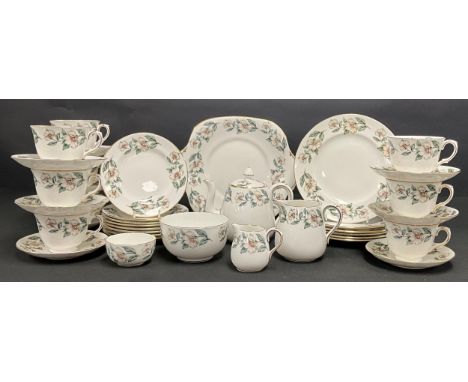 A Crown Staffordshire part tea service, printed with blossom, including cake plate, side plates, teapot, milk jug, cream jug,