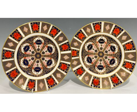 A pair of Royal Crown Derby Imari 1128 pattern dinner plates, 27cm diameter, printed mark in red, first quality 