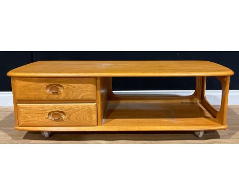 An Ercol elm Minerva coffee table, 39cm high, 124.5cm long, 53cm wide 
