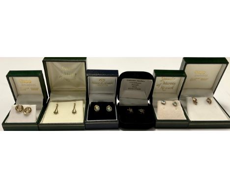 A pair of 9ct gold opal earrings, boxed; five other pairs of gold earrings, all boxed (6) 