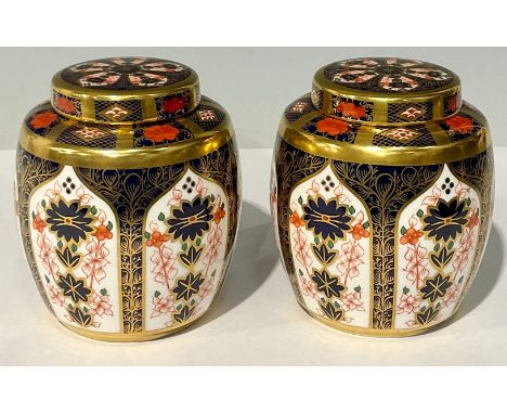 A pair of Royal Crown Derby Imari 1128 pattern ginger jars and covers, 12cm, first quality, printed marks in red (2) 