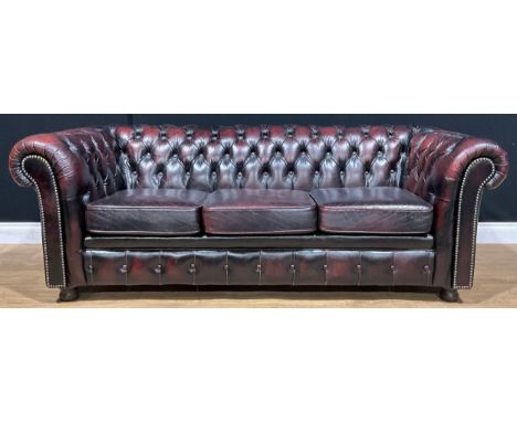 A Victorian style Chesterfield type sofa, 194.5cm wideNB - This lot is offered for sale as a work of art, the cushions may no