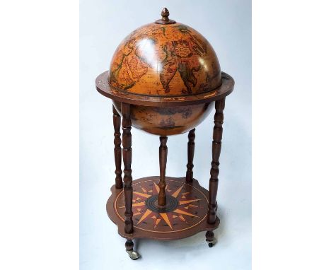 GLOBE COCKTAIL CABINET, in the form of an antique terrestrial globe with rising lid, fitted interior and stand with castors, 