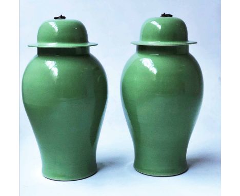 TEMPLE JARS, a pair, Chinese leaf green ceramic ginger jar form with lids, 53cm H. (2)