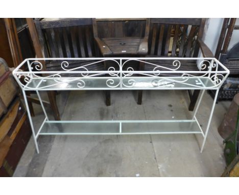 A large painted wrought steel planter 