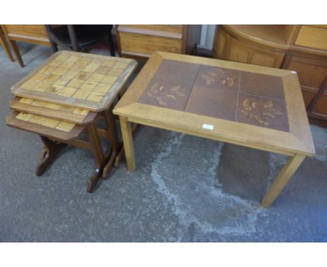 A Danish Gunnar N. Larsen Mobelfabrik light oak and tiled top coffee table and a teak and tiled top nest of tables 