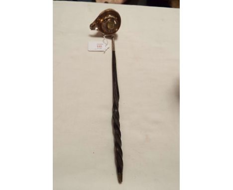 A London 1807 silver toddy ladle with coin insert and baleen twist handle