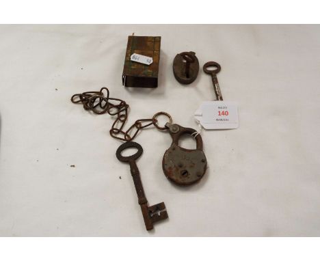 Two vintage padlocks, two vintage keys and a metal matchbox cover