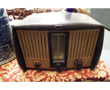 A vintage valve G.E.C. radio in bakelite case