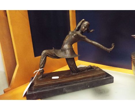 A vintage bronze statue of a dancer resting on marble plinth base, signed DH Chiparus 