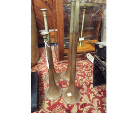 Four brass and copper hunting horns