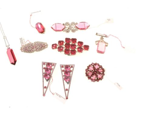 Eight pink and clear paste dress clips, brooches and buckle, a Czechoslovakian fob brooch, lozenge shaped belt buckle set wit