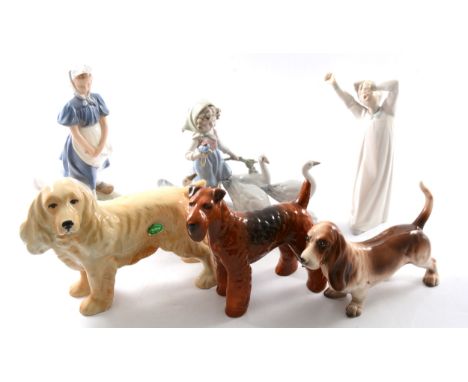 Collection of decorative figurines and ornaments, including Lladro seated cat, Nao ducks, Coopercraft dogs, modern Spode figu