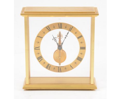 Jaeger LeCoultre - a Swiss brass skeleton mantel clock, arabic numeral chapter ring, glass panelled sides, numbered 508S on b