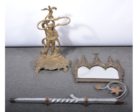 Small gothic style wall mirror, shaped arches with figures to each side, width 44cm, a metal stick stand, a gold painted vase