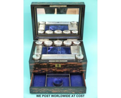 A 19thC coromandel or similar vanity/jewellery box, the interior fitted with various glass bottles with engraved lids. The mi