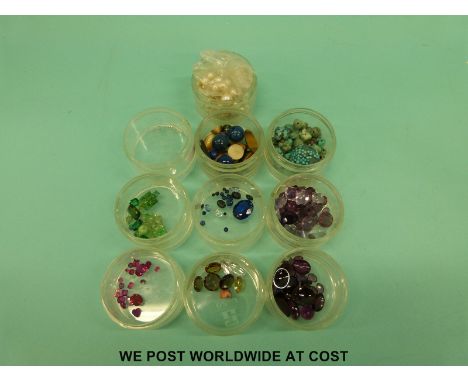 A quantity of loose gemstones to include pearls, garnet cabochons, amethyst, turquoise, tigers eye, sapphires, peridot, jadei