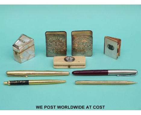 Hallmarked silver-mounted books, mother of pearl thimble case, ivory box with compass and thermometer, pens including Sheaffe