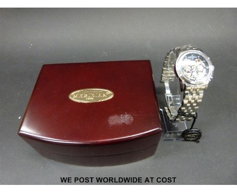 Meridian multi-function automatic gentleman's wristwatch, movement visible through dial and back, four sub-dials displaying m