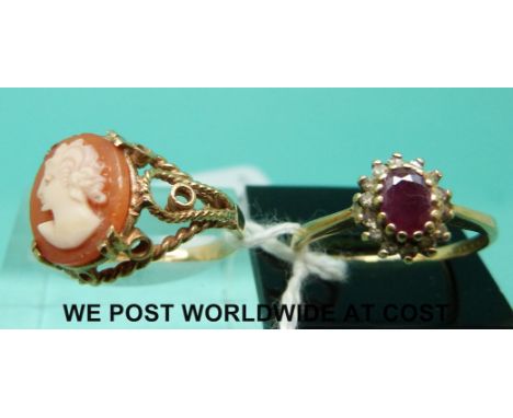 Two 9ct gold rings, one set with a ruby surrounded by diamonds. 