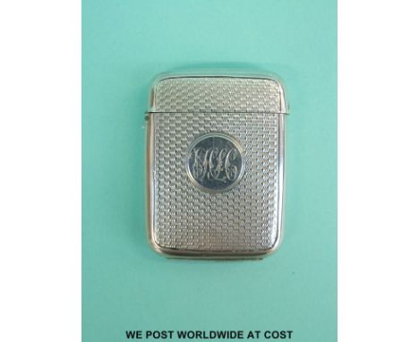 A Victorian hallmarked silver engine turned vesta case with gilt wash interior, Birmingham 1885 maker Colin Cheshire, height 