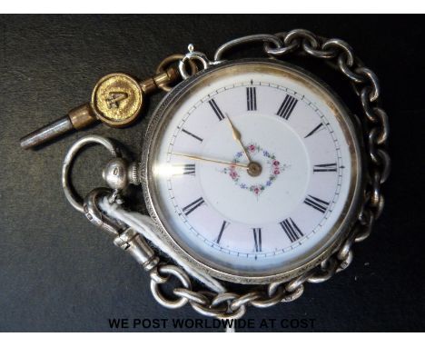 Swiss made ladies silver fob watch with gold hands and black Roman numerals to the floral decorated white enamel dial, in eng