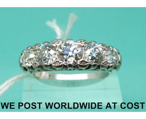 An 18ct white gold ring set with five old English cut diamonds totalling approximately 2.86ct, with insurance valuation from 