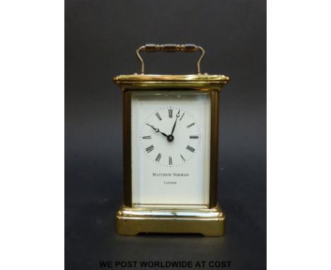 Matthew Norman to dial brass carriage clock in corniche style case, white enamel dial with Roman numerals, Breguet style hand