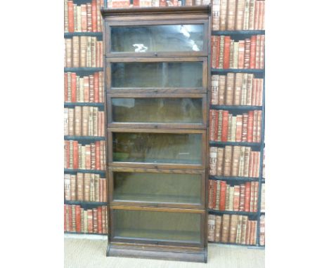 An oak Globe Wernicke style six section glazed bookcase (H207xW87xD32cm)