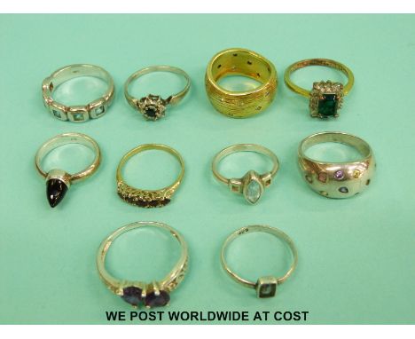 Ten silver rings set with amethyst, garnets, topaz etc 