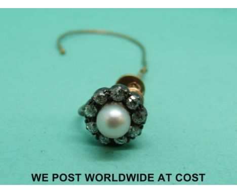 A Victorian earring set with a pearl and diamonds