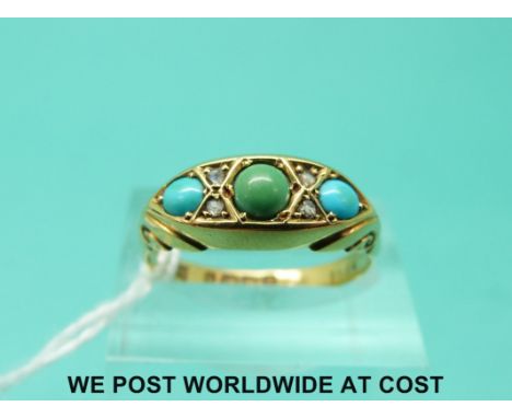 An 18ct gold ring set with turquoise and diamonds (size R)