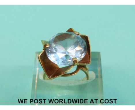 A 9ct gold ring set with a large blue zircon, (Size K, 6.1g)