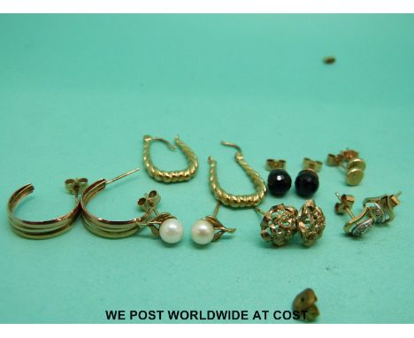 Seven pairs of 9ct gold earrings including pearl set, diamond set and two pairs of hoops