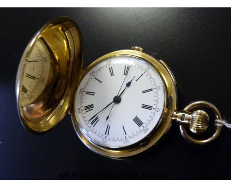 An 18ct gold full hunter repeater pocket watch with chronograph mechanism, keyless winding movement and black Roman numerals 