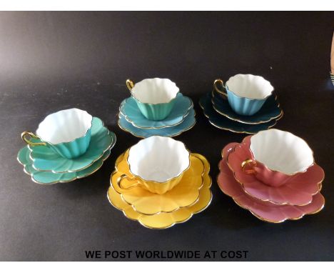 A harlequin set of Royal Stuart tea cups, saucers and plates