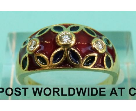 An 18ct gold ring set with three diamonds surrounded by red, blue and green enamel (Size N, 5.8g)