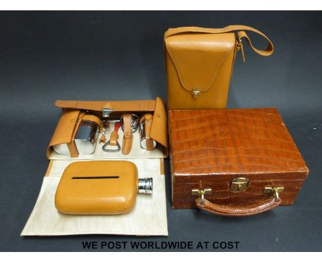 A crocodile skin jewellery box and two gentleman's cased flask sets