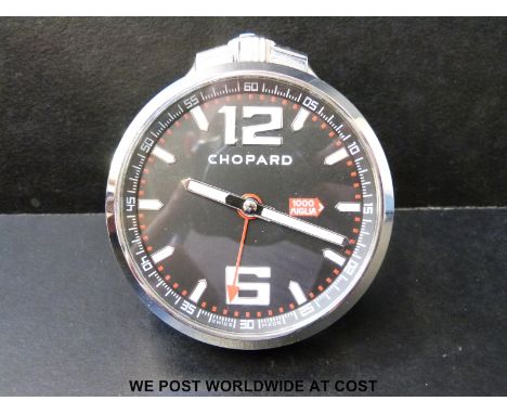 Chopard Mille Miglia GT XL desk or table clock with white hands and markers on black face in palladium finish case, marked to